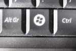 Retaining clip underneath command key