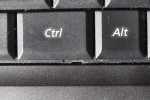 Retaining clip released underneath left control key